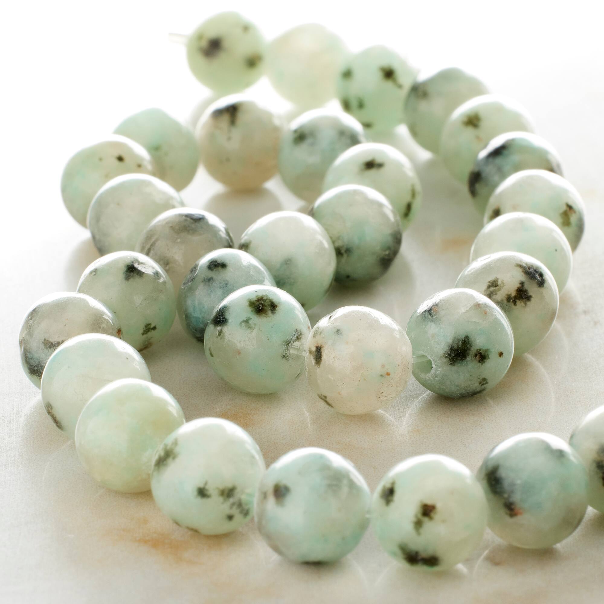 12 Pack: White Kiwi Stone Round Beads, 8mm by Bead Landing™